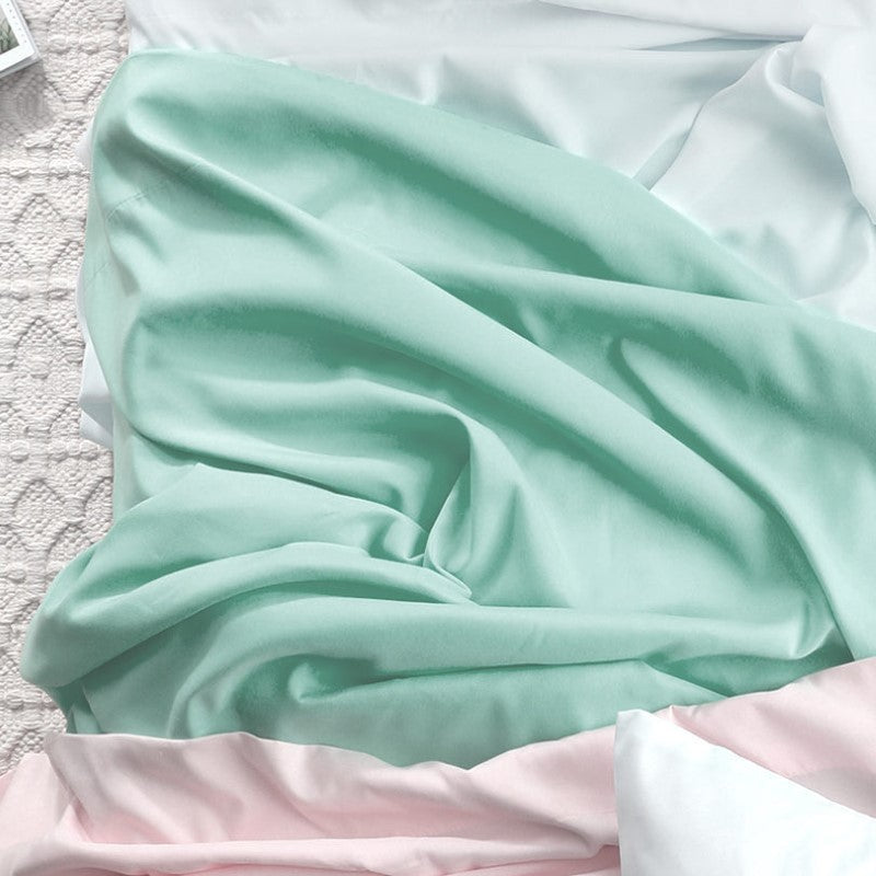 King Sheet Set in Sea Mist featuring soft, wrinkle-resistant microfiber, deep fitted sheets, and a matching drawstring bag.