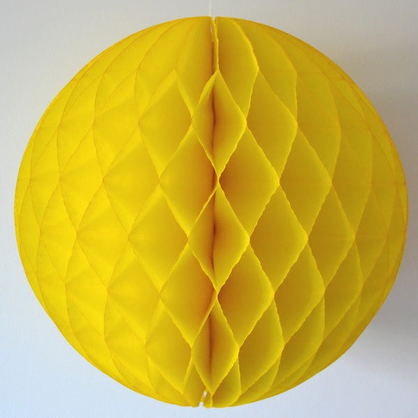 Vibrant yellow honeycomb balls, 15cm, perfect for decorating events; pack of 10 for hanging or table centerpieces.