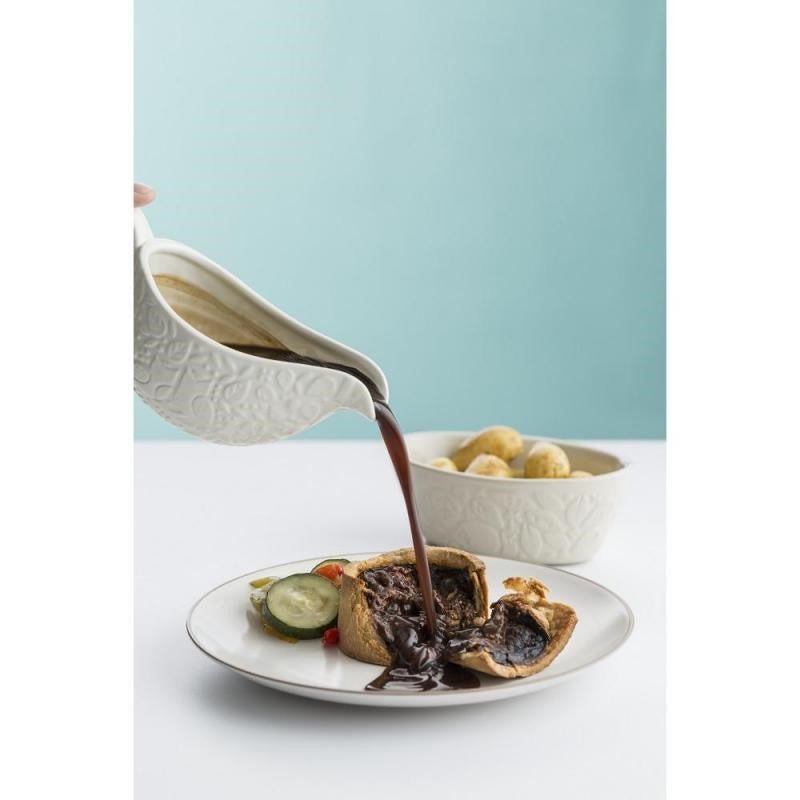 White Mason Cash gravy boat with embossed forest design, 400ml capacity, perfect for serving sauces and gravies.