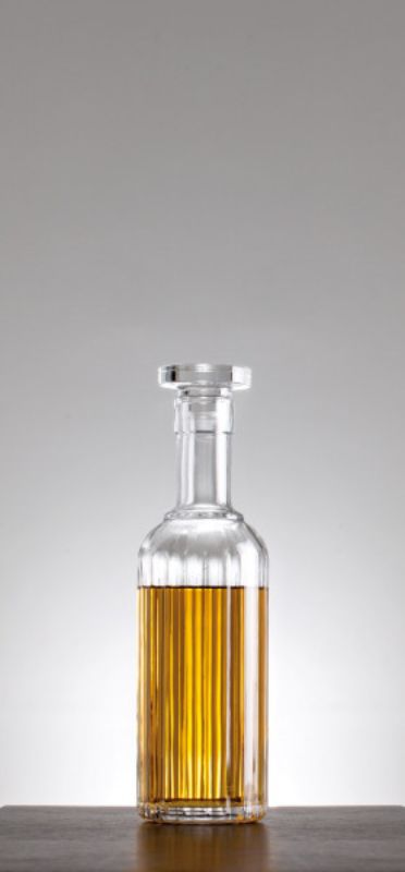 Elegant Luigi Bormioli Bach Whiskey Set featuring a faceted carafe and matching tumblers in ultra-clear lead-free crystal.