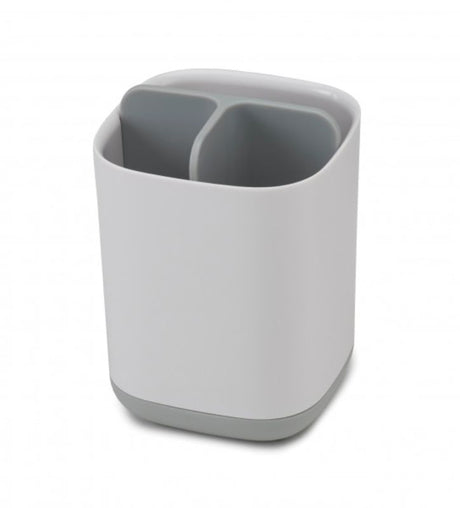 Joseph Joseph EasyStore Toothbrush Caddy in Grey/White, with three sections for organized oral care storage and easy cleaning.