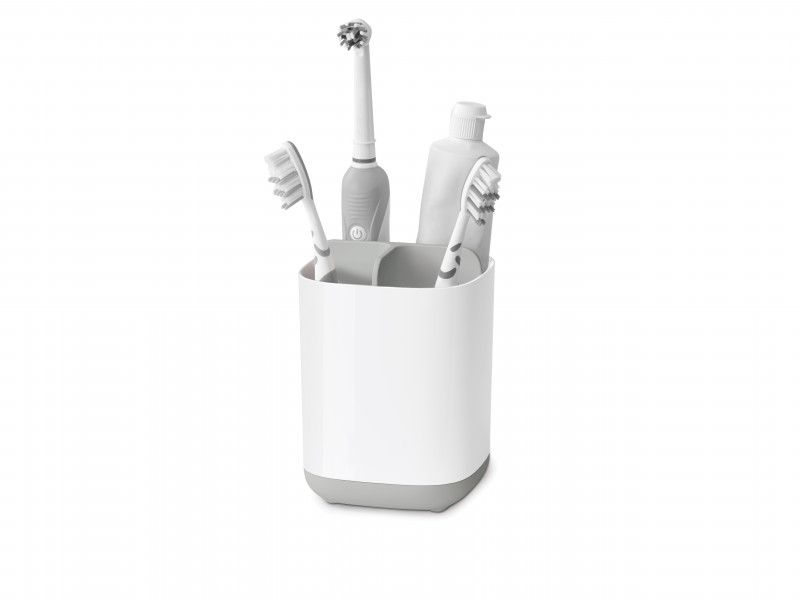 Joseph Joseph EasyStore Toothbrush Caddy in Grey/White, featuring three sections for organized oral care storage and easy cleaning.