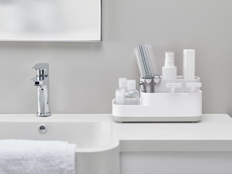 Joseph Joseph EasyStore Bathroom Caddy in Grey/White, a multifunctional organizer with compartments for grooming essentials.