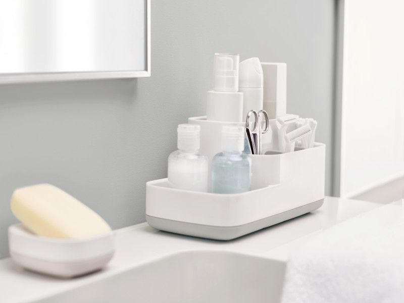Joseph Joseph EasyStore Bathroom Caddy in Grey/White featuring multiple compartments for organized grooming essentials.