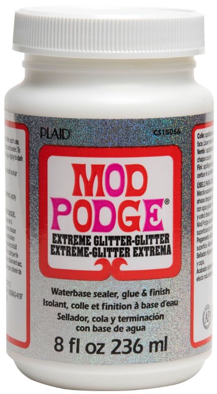 Mod Podge Extreme Glitter, an 8 oz quick-drying all-in-one glue and sealant, adds stunning shimmer to any craft project.