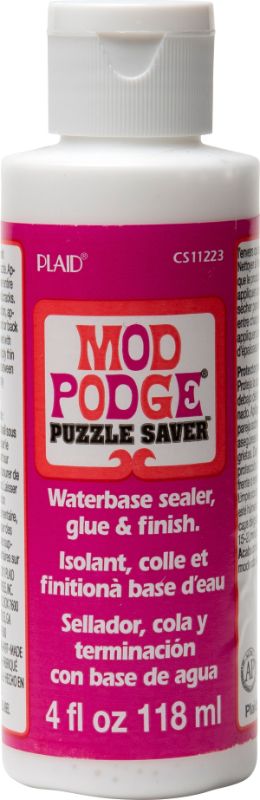 Mod Podge Puzzle Saver 2oz bottle to preserve puzzles with quick-drying, clear, glossy finish; non-toxic and easy to clean.