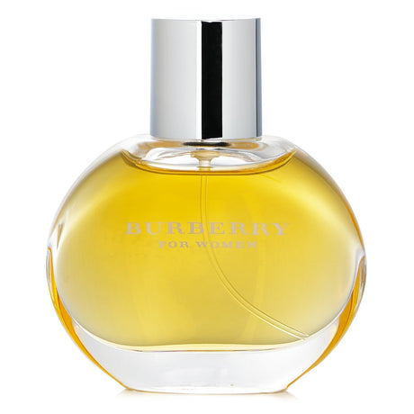 Burberry Eau De Parfum Spray 50ml showcases fruity notes of peach, apricot, and black currant, embodying British elegance.