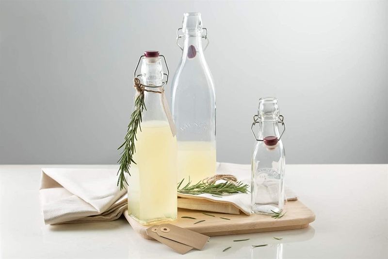 Kilner 550ml square glass clip top bottle for storing sauces, oils, and syrups with a vintage design and airtight seal.