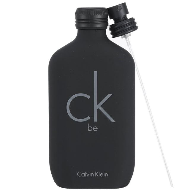 Calvin Klein CK Be Eau De Toilette Spray 50ml, a unisex fragrance with refreshing bergamot, peach, and musky sandalwood notes.