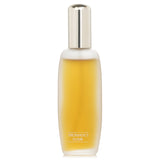 Clinique Aromatics Elixir Parfum Spray 25ml features a sophisticated blend of chypre, palmarosa, and oakmoss for an elegant scent.