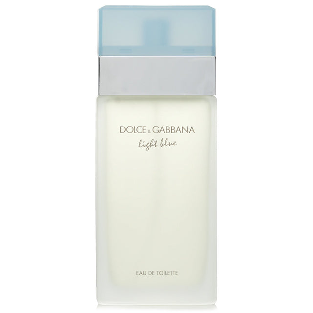 Bottle of Dolce & Gabbana Light Blue Eau De Toilette Spray, 100ml, embodying floral notes of jasmine, freesia, musk, and amber.