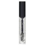 Clear brow gel from MAC for grooming, enhancing shine, and providing long-lasting hold without flaking or stiffness.