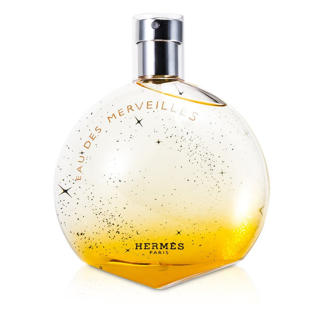 Hermes Eau Des Merveilles Eau De Toilette Spray, an oriental woody scent with citrus top notes and warm, complex base notes.