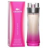 Lacoste Touch Of Pink Eau De Toilette Spray 90ml in original packaging, featuring floral and citrus notes for modern women.