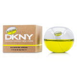 50ml DKNY Be Delicious Eau De Parfum, featuring fruity floral notes of apple, rose, and warm musk, perfect for modern women.