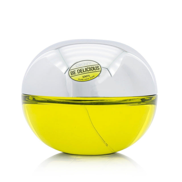 DKNY Be Delicious Eau De Parfum Spray in a 50ml bottle, featuring fruity floral notes ideal for modern women.