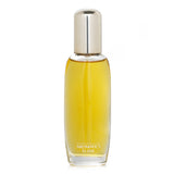 Clinique Aromatics Elixir Eau De Toilette Spray 45ml, a fresh, woody fragrance blend of rose, chamomile, and patchouli.