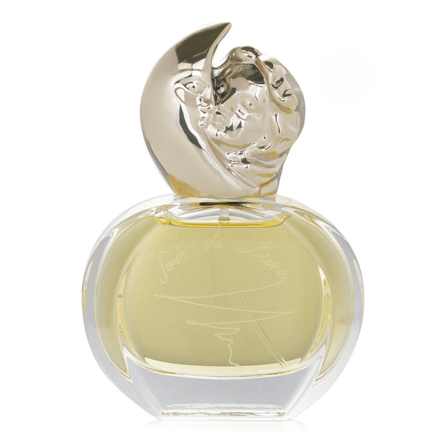 Elegant 30ml bottle of Sisley - Soir De Lune Eau De Parfum, featuring a moon and woman cap, with a rich fruity-chypre fragrance.