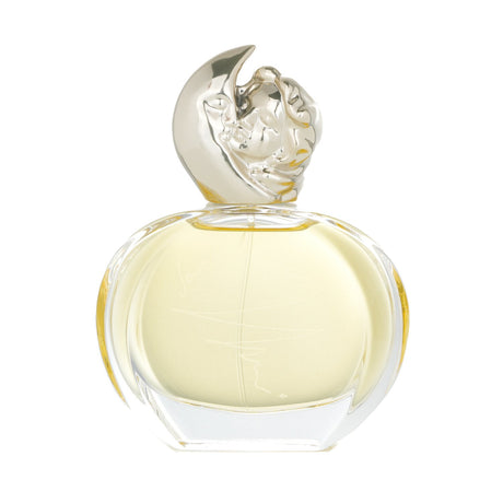 Eau de parfum in a moon-inspired bottle featuring vibrant citrus, floral heart, and earthy base notes for evening wear.