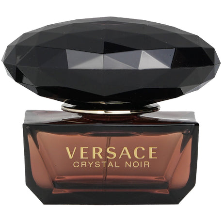 Versace Crystal Noir Eau De Toilette Spray 50ml, featuring an elegant blend of floral and warm notes for sophisticated evening wear.