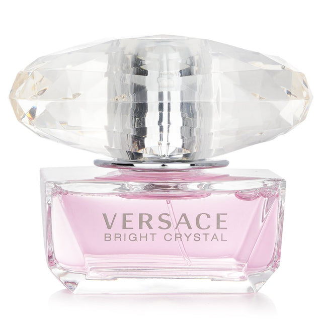 Versace Bright Crystal Eau De Toilette Spray 50ml, a floral fruity fragrance with pomegranate, peony, and warm musk notes.