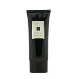 Luxurious Jo Malone Vitamin E hand cream in 100ml, deeply nourishes skin with pomelo and cassis scent, leaving hands soft.