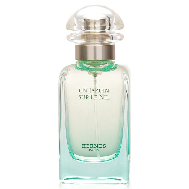 Hermes - Un Jardin Sur Le Nil Eau De Toilette Spray in a 50ml bottle, featuring refreshing green mango, lotus, and warm wood notes.