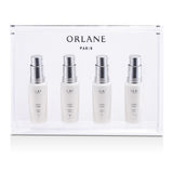 Orlane B21 Whitening Essence in 4x7.5ml ampoules, designed to lighten dark spots and enhance skin radiance and clarity.