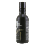 Aveda Men Pure-Formance Liquid Pomade bottle showcasing lightweight styling, moderate hold, and a refreshing citrus aroma.