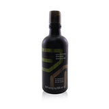 Aveda Men Pure-Formance Shampoo 300ml, a refreshing men’s shampoo that reduces oil, calms scalp, and adds shine.