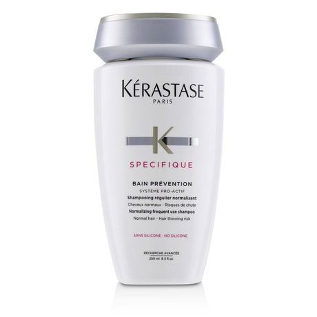 Kerastase Specifique shampoo for normal hair; combats thinning, balances scalp, prevents dandruff, promotes shiny, healthy hair.