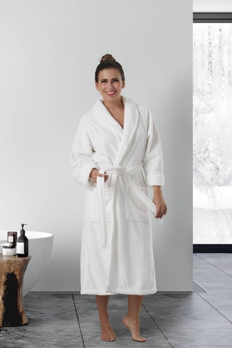 Warm white bathrobe with shawl collar, pockets, and waist tie, made from 100% polyester, size L/XL by BAKSANA.