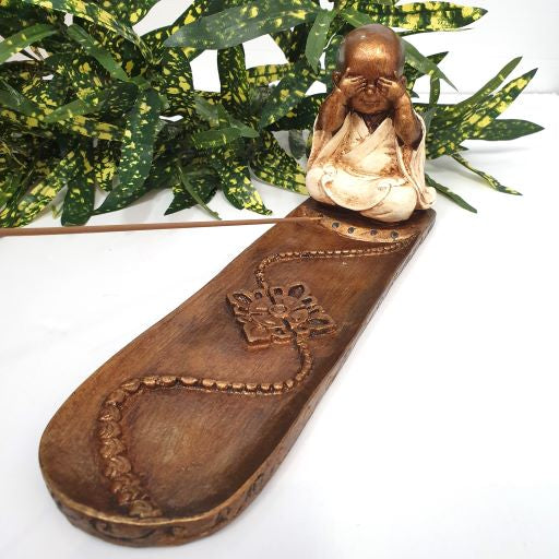 Elegant monk-themed long incense holder, 30x9x13cm, perfect for meditation and creating a serene atmosphere.