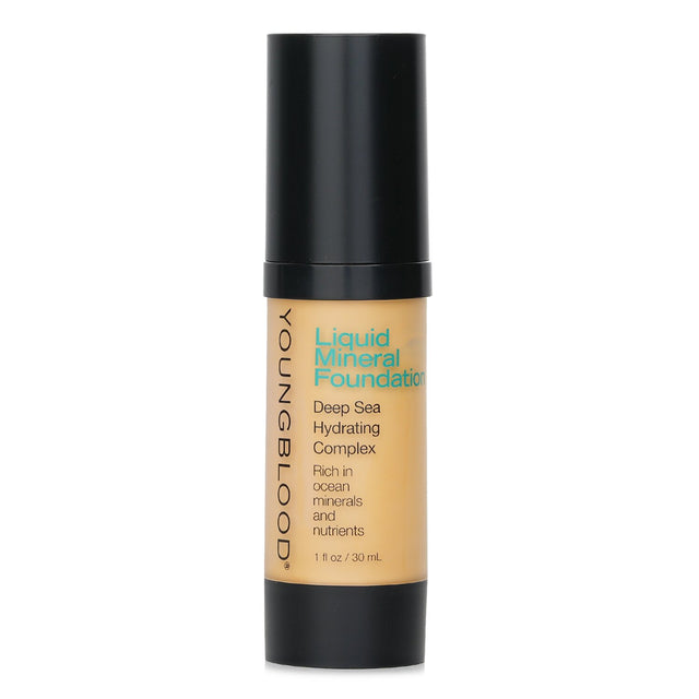 Youngblood Liquid Mineral Foundation in Sand, 30ml, offers a radiant finish with hydration from botanicals and ocean minerals.