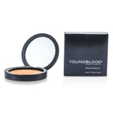 Lightweight mineral powder by Youngblood for a sun-kissed glow, perfect for face and body, convenient for on-the-go touch-ups.