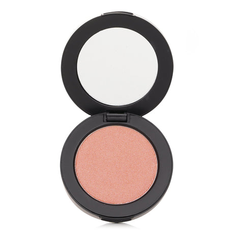 Youngblood Pressed Mineral Blush in Sugar Plum, a versatile 3g blush offering a sheer, healthy glow for cheeks and more.