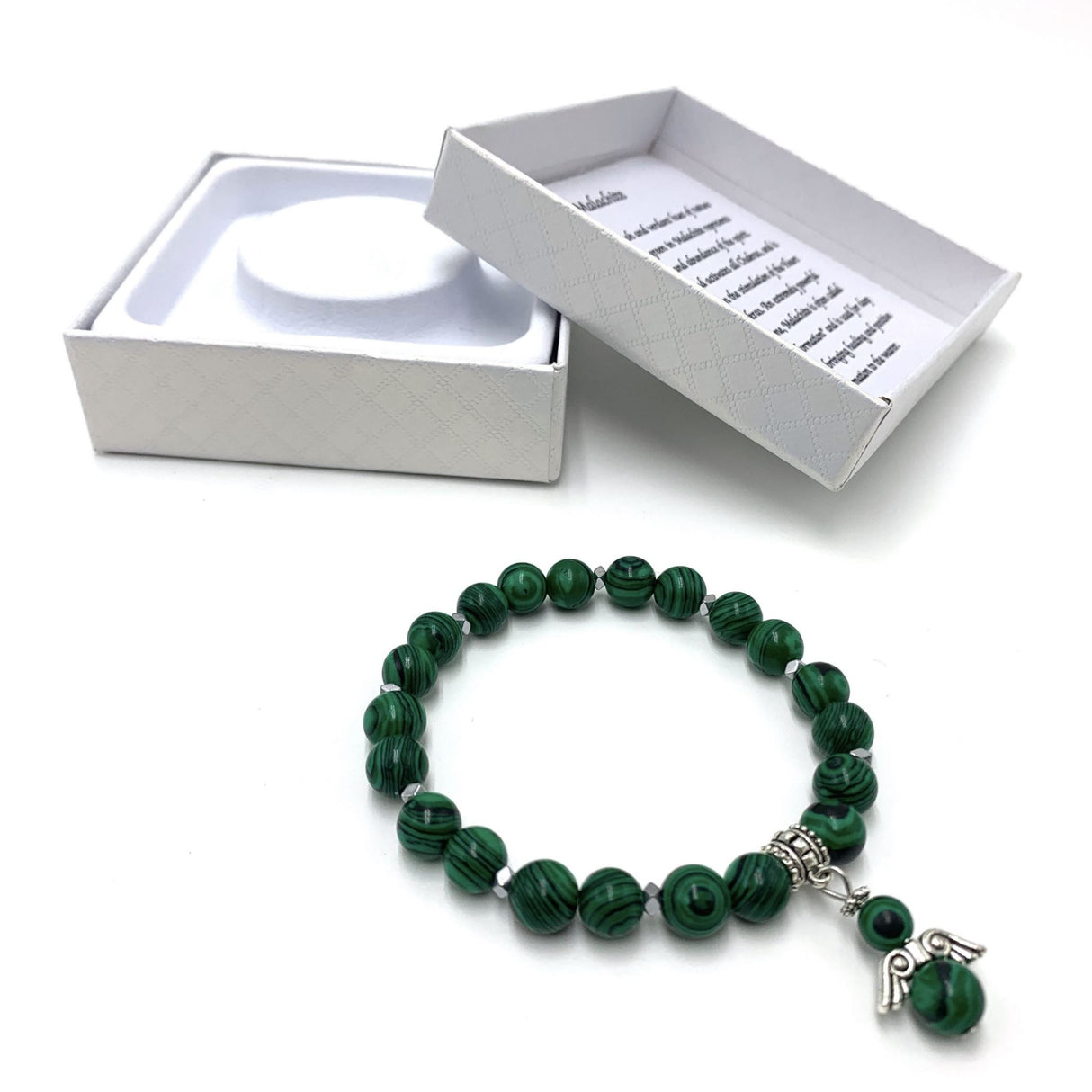 Handcrafted Malachite Bracelet with 7mm beads, promoting personal growth and energy cleansing with a lush green design.