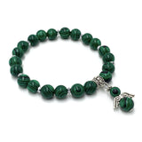 Handcrafted malachite bracelet with 7mm beads, symbolizing growth and transformation, enhancing spiritual wellness.