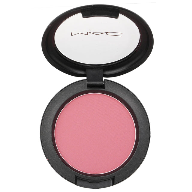 MAC Powder Blush in #Fleur Power features a soft bright pinkish-coral shade for a natural, glowing flush on cheeks.