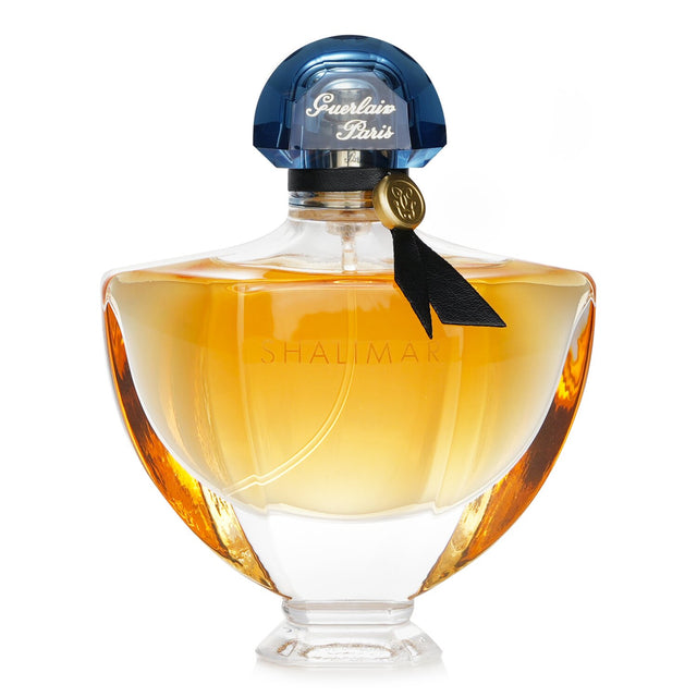 Guerlain Shalimar Eau De Parfum Spray 50ml, a captivating fragrance blending citrus, floral, and warm notes for elegant allure.