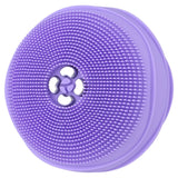 Rechargeable silicone facial cleanser, featuring sonic pulsation and warming elements for deep, gentle skin cleansing.