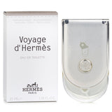 Hermes Voyage D'Hermes 35ml refillable spray featuring a fresh, woody unisex fragrance with sandalwood, cedar, and white musk notes.