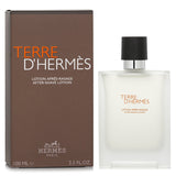 Luxurious Terre D'Hermes After Shave Lotion in 100ml, soothes skin, calms irritation, and leaves a subtle woody fragrance.