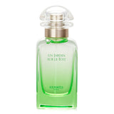 Hermes Un Jardin Sur Le Toit Eau De Toilette Spray, 50ml, features fruity notes of apple, pear, basil, and rose for a refreshing scent.