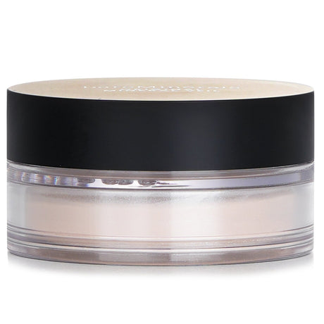 Sheer translucent setting powder for a radiant, flawless finish, suitable for all skin tones and free from synthetic additives.