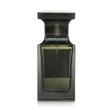 Tom Ford Oud Wood Eau De Parfum spray in a 50ml bottle, featuring an exotic woody scent for sophisticated men and women.