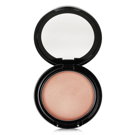 Cream highlighter in #02 Afterglow offers a sheer, natural glow for eyes, cheeks, and lips with a velvety texture.