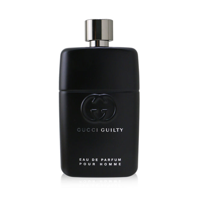 Gucci Guilty Pour Homme Eau De Parfum Spray, a woody spicy fragrance with notes of rose, chili, and cedar, perfect for any occasion.