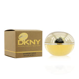 Golden Delicious Eau De Parfum in a 100ml bottle, featuring floral and woody notes for a captivating women's fragrance.