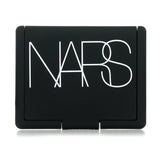 NARS Blush in Amour: velvety texture, sheer finish, enhances natural beauty, suitable for all skin tones, compact and versatile.